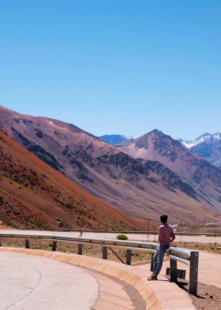 a man walking on a bench