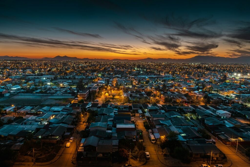 aerial photography of houses and buildings during night time
