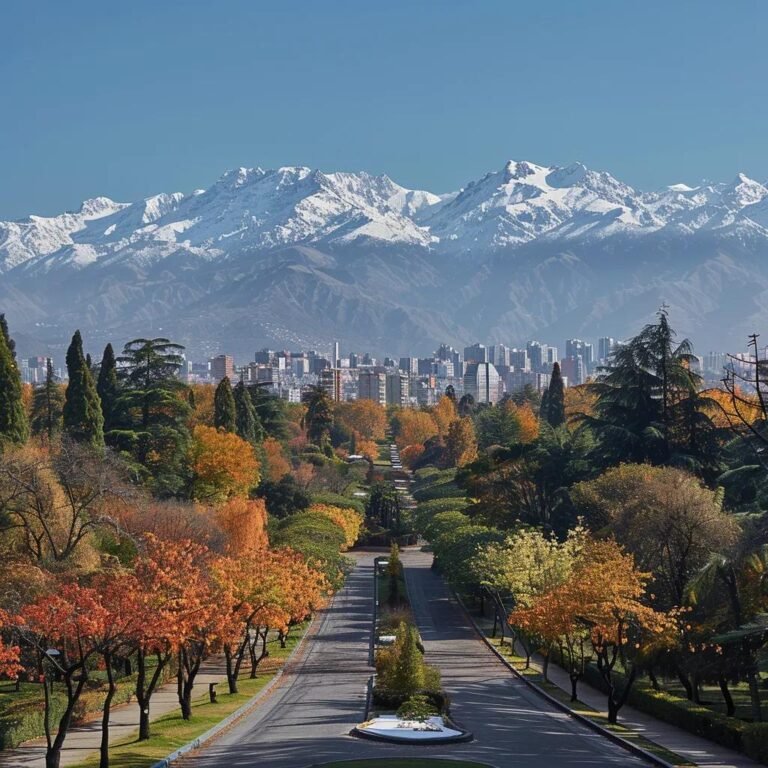 uma vista panorâmica e vibrante de santiago, chile, em setembro, com os andes cobertos de neve ao fundo, árvores em parques começando a florescer e um céu claro, capturando a essência da transição do inverno para a primavera na cidade.