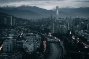 a view of a city with mountains in the background